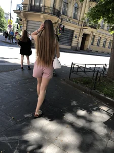 Cute candid girl in pink shorts street photos