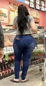 Giant butt in tight blue jeans at the supermarket creepshots