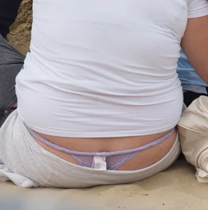 Bunch of girls with their thongs hanging out