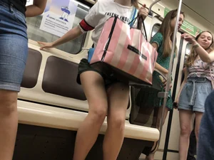 Subway Candid Girl in a Mask And Shorts - Long Sexy Legs With a Mole Train Creepshots