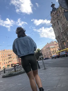Amazing tall candid girl with long slim legs and booty in spandex shorts