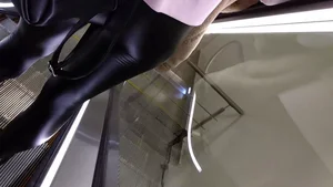 Girl in Leather Pants Escalator Candid Closeup Video