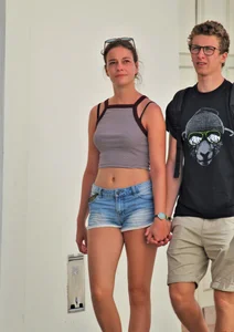 Beautiful teen out with boyfriend in short jean shorts