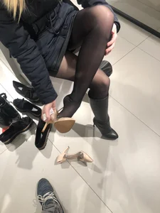 Woman in Black Pantyhose Changing Shoes Candid Closeup
