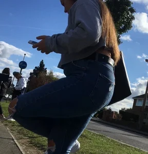 Long haired beauty teen with a tight ass in jeans