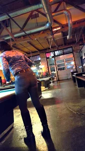 Milf in Tight Jeans playing pool