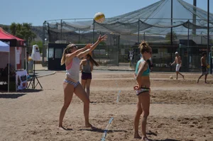 Beach volleyball blonde looking sexy and showing her body off