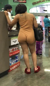Latina with hard nipples and a big booty in tight spandex shorts outfit