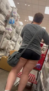 Almost busted by target security for this meaty mom showing cheeks