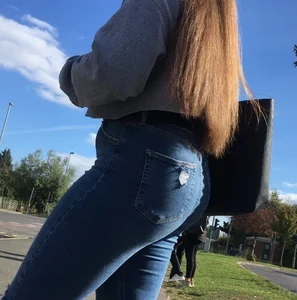 Long haired beauty teen with a tight ass in jeans