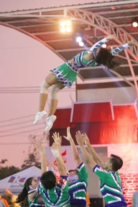 Bunch of athletic Thai cheerleaders at a competition
