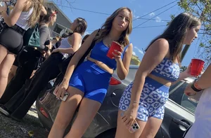 College party part 4. Cheeked up college gals wearing short shorts (plus face)