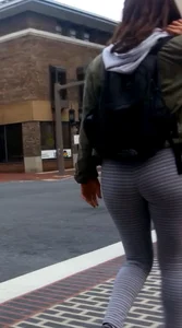 College girl in striped leggings walking with nice ass