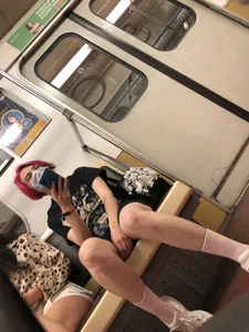 Cute Candid Teen With Red Hair in a Skirt Subway Creepshots Gallery