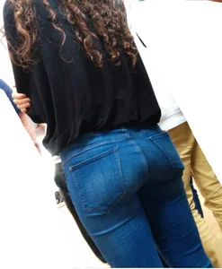 Hot butt in tight blue jeans closeups