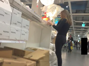 Skinny girl shopping in tight black jeans