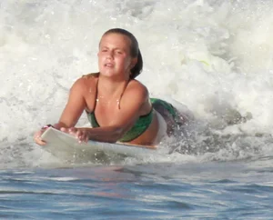 Hot surfer chicks out in the water