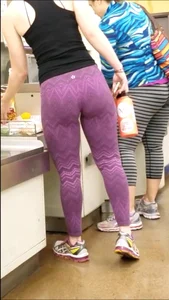 Thick Blonde in purple leggings