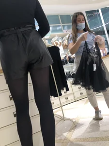 Shop Assistant's Flat Booty in Leather Shorts And Legs in Black Pantyhose Store Creepshots Gallery