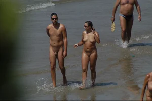 Girls on a nude beach in Sitges, Spain