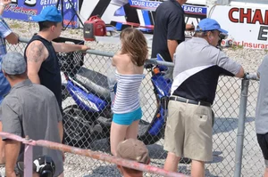Skinny babe with a cute little ass in tiny blue shorts