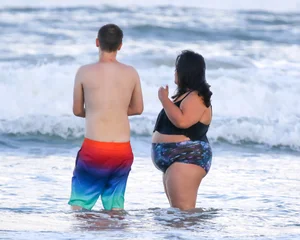 Extra thick girl at the beach in a bikini