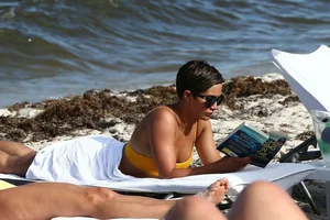 Frankie Bridge nip slips in a bikini on the beach