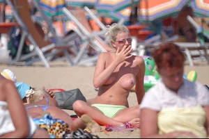 Girls on a nude beach in Bibione, Italy