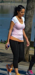 Thick lady walking in leggings with a big booty
