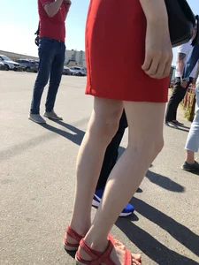 Girl in a Red Dress and Sandals With Thin, Pale Legs on the Crosswalk City Creepshots Gallery