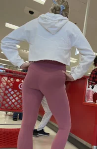Blonde in pink leggings, long legs and nice booty