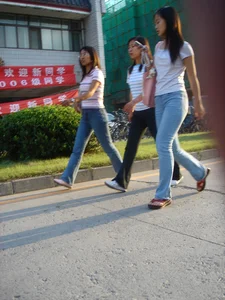 Cute Asian girl with a nice booty in tight jeans