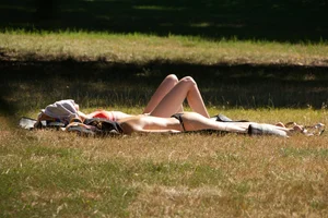 Creepshots of some girls in the park getting some sun in bikinis