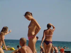 Beach voyeur babes in bikinis, thongs and topless