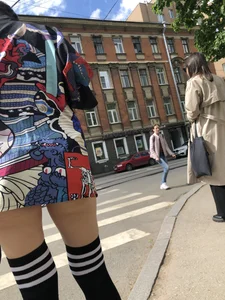 An Anime Fan Teen in a Short Skirt And Stockings Bending Over on the Crosswalk Street Creepshots