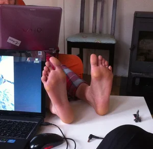 Girl with Her Bare Feet on Table Home Candid