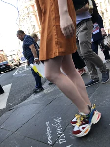 Cute Teen Girl in a Dress With Slim Legs Standing in the Subway Train, Then Crossing the Street Photo Gallery