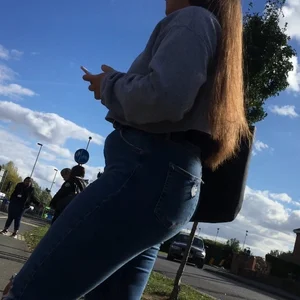 Long haired beauty teen with a tight ass in jeans