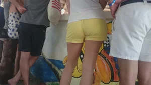 Milf in yellow shorts with vpl and a wedgie