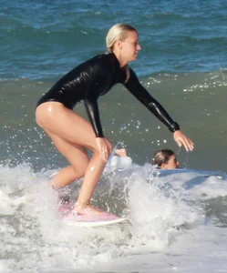 Hot surfer chicks out in the water