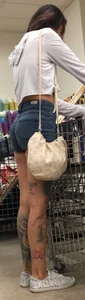 Slim tatted succubus in cheeky jean shorts