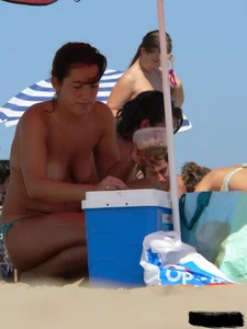 2 topless thonged sexy friends on the beach with great bodies
