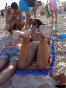 Beach voyeur girls in bikinis, thongs and topless