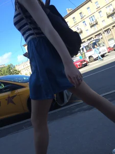 Girl in a Skirt With Sexy Skinny Legs Walking Down a Street Creepshots Collection