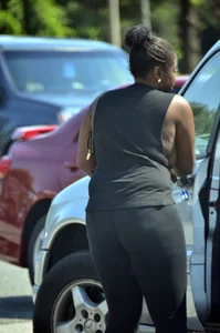 Chubby black lady with big tits and no bra lets it slip