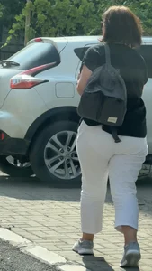 Chunky milf wearing tight white pants street creepshot