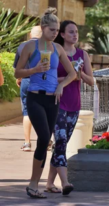 Sexy blonde and friend walking in leggings