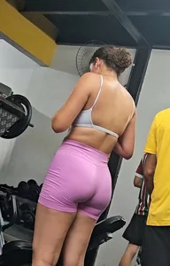 Girl in tight pink shorts