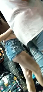 Tight teen ass in cheeky shorts (so hot)