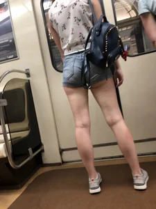 Cute And Slightly Awkward Tall Teen Girl in a Top and Denim Shorts Subway Train Candid Photos